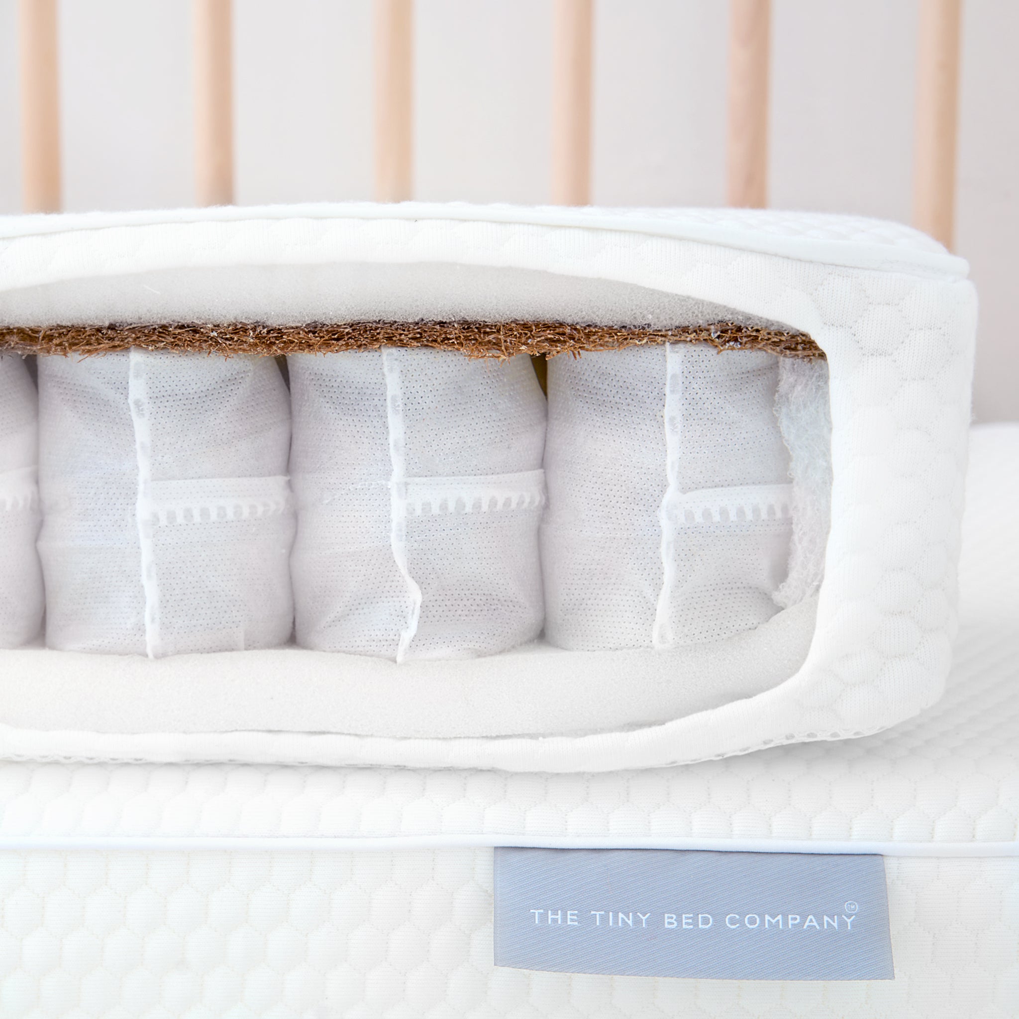 Tiny Dreamer Deluxe™ - Coconut Coir & Pocket Sprung Cot Mattress to fit SnüzKot (117 x 68cm) - The Tiny Bed Company™